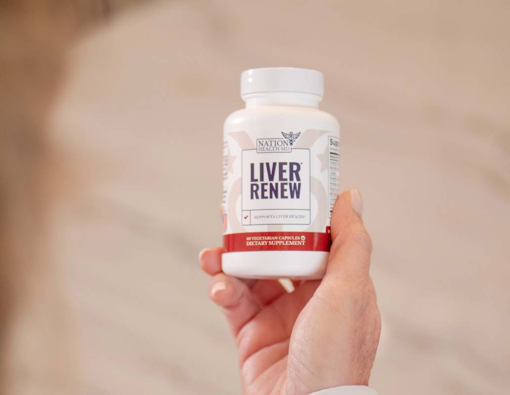 Liver Renew bottle in hand