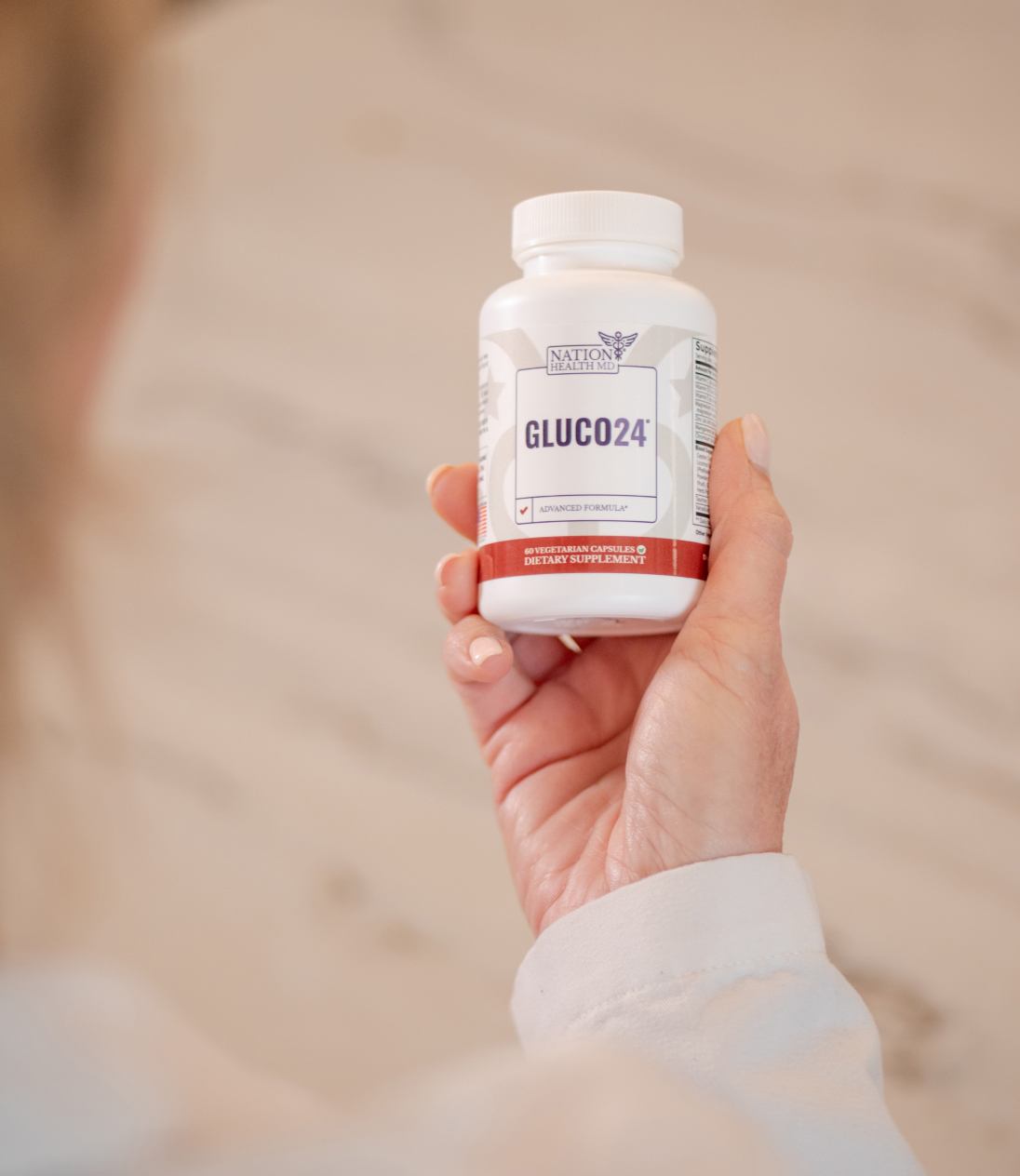 gluco24 bottle in hand