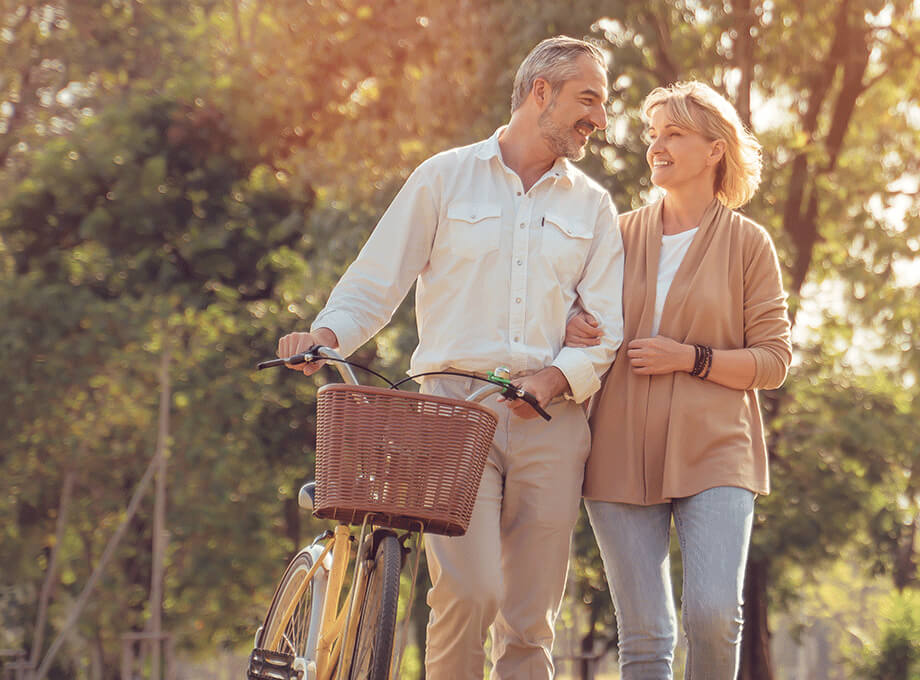 couple with bicycle