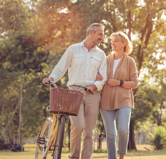 couple with bicycle