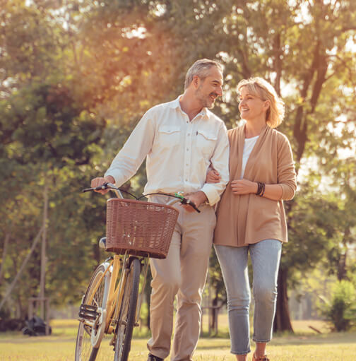 couple with bicycle